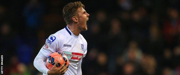 Cole Stockton celebrates his goal for Tranmere Rovers