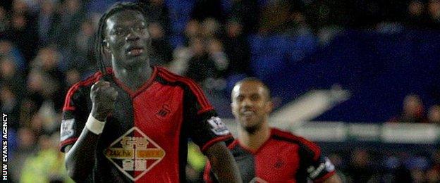 Bafetimbi Gomis celebrates scoring at Tranmere Rovers