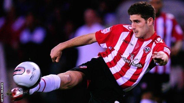 Ched Evans connects with a volley for Sheffield United