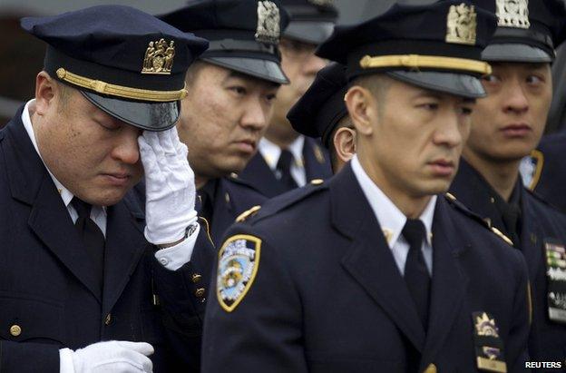 Asian-American police officers at the funeral of New York Police Department Officer Wenjian Liu, 4 January