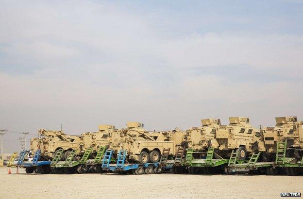 US military vehicles wait at Bagram to be shipped to Kuwait, 2 January