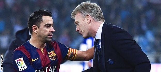 Xavi Hernandez and David Moyes