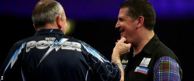 Phil Taylor jokes with Gary Anderson