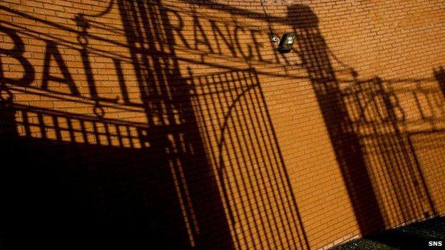 A shadow of the gates at Ibrox Stadium