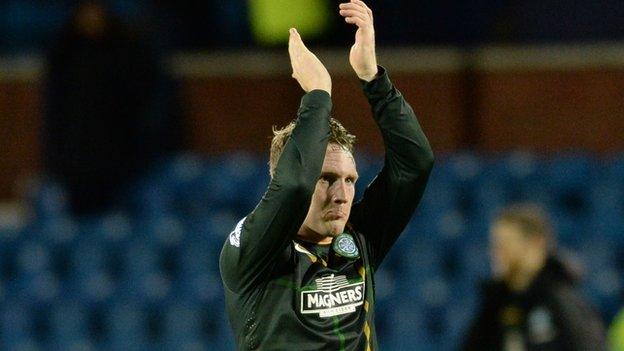 Kris Commons applauds the Celtic fans at Rugby Park