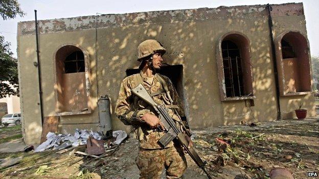 Standing guard outside school in Peshawar