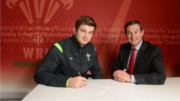 Scarlets prop Rhodri Jones and WRU chief Roger Lewis