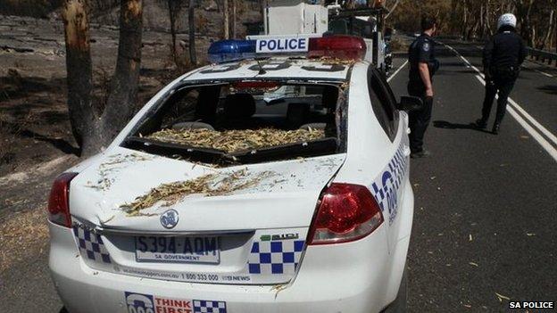 Crushed police car in South Australia (7 Jan 2014)