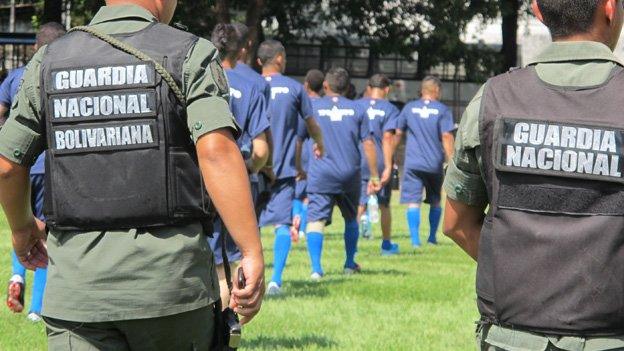 Tocoron players file onto the pitch