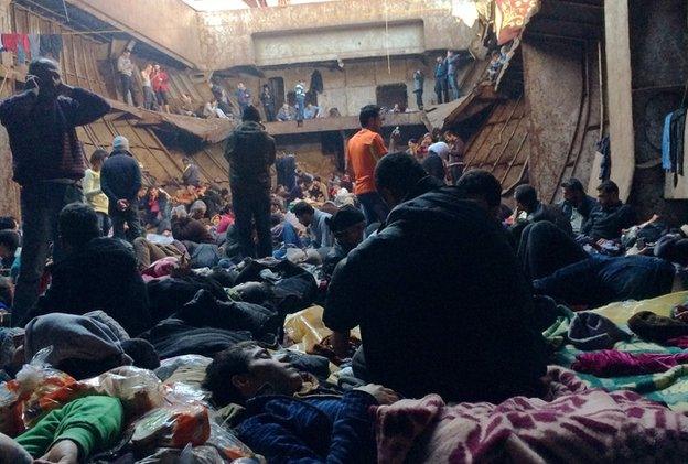 A handout picture taken on 25 December 2014 by Syrian migrants with mobile phones and released on January 5 2015 shows migrants aboard the Moldovan-flagged ship Blue Sky M before their arrival in Gallipoli, Italy