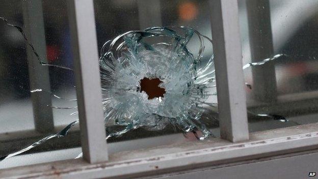 A bullet hole in a building near the Charlie Hebdo offices