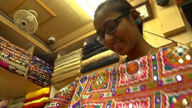 Akanksha is in retail heaven in a Chandni Chowk fabric shop