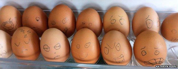 Army of eggs with faces drawn on them