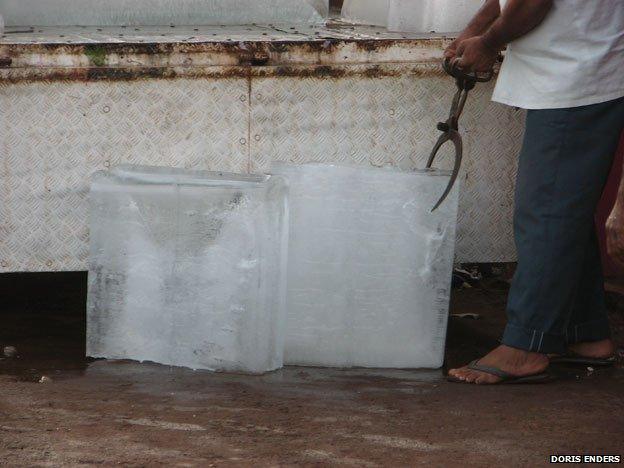 Two large blocks of ice next to a chest