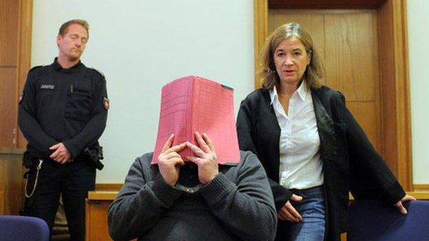 Niels H. arrives for his trial at court on November 27, 2014 in Oldenburg, Germany.