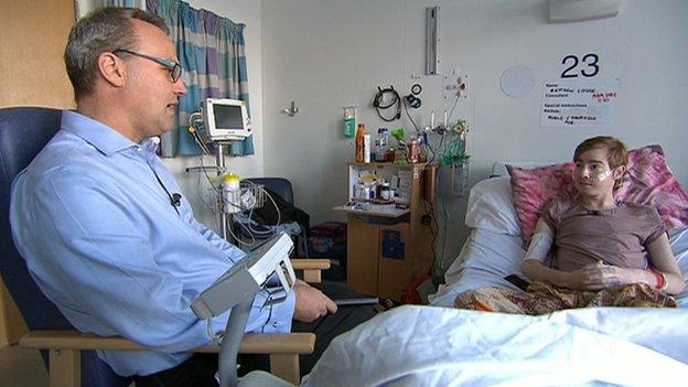 Matt Lodge in hospital with the BBC's Matthew Hill