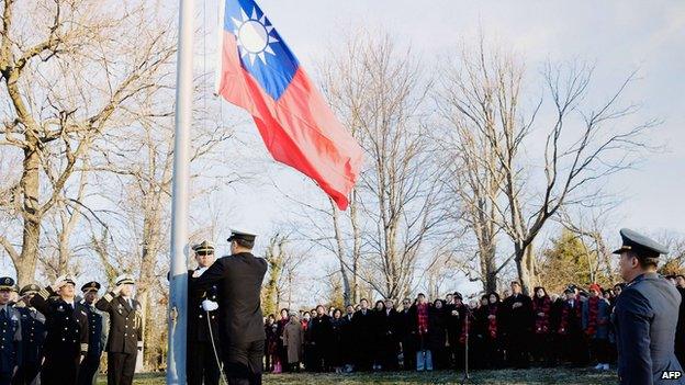 This handout photo released by the Taiwan Foreign Ministry shows a flag-raising ceremony that took place at Taiwan's US de facto embassy in Washington DC on 1 January, 2015