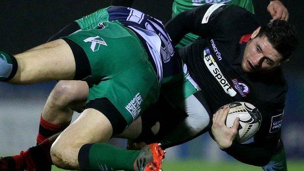 Robbie Henshaw tackles Jack Cuthbert at the Sportsground