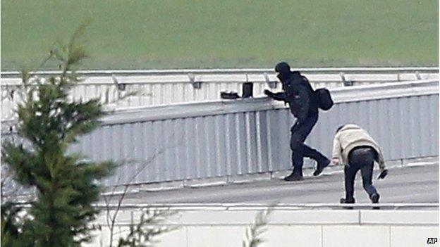 Police on the roof of a building in Dammartin-en-Goele, 9 January 2015