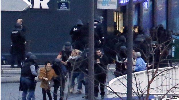 Police and hostages at a kosher food store in Porte de Vincennes, Paris, 9 January, 2013