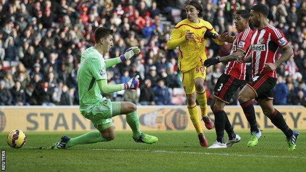 Liverpool wing-back Lazar Markovic (centre) scores for his side at Sunderland