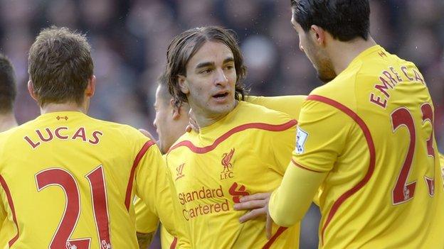 Liverpool wing-back Lazar Markovic (centre) is congratulated after his goal against Sunderland