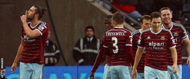 Andy Carroll celebrates his goal against Swansea