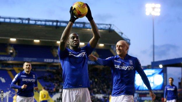 Clayton Donaldson celebrates his hat-trick against Wigan