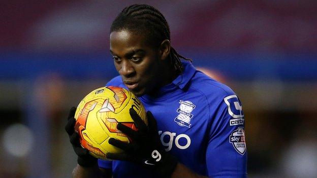 Clayton Donaldson celebrates his hat-trick against Wigan