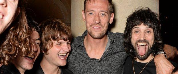 Jeff Wootton, Jay Sharrock, Peter Crouch and Sergio Pizzorno after the Kasabian gig