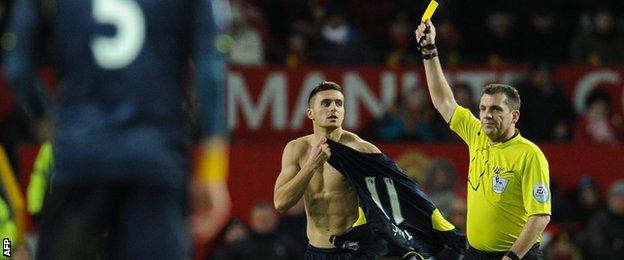 Dusan Tadic was booked for taking off his shirt during his goal celebration