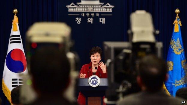 South Korean President Park Geun-hye, centre, speaks during her New Year's press conference at the presidential Blue House in Seoul Monday, 12 January 2015.