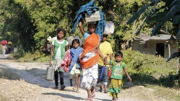 Hundreds of tribespeople fled their homes after the attacks in Assam