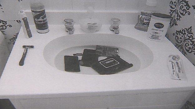 Electronic equipment in bathroom sink