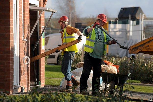 Builders on a site in Birmingham