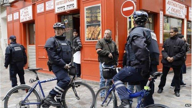 Police patrol in the Marais, a historic Jewish quarter in central Paris, 12 January 2015