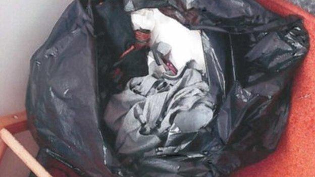 Bin bag of Breck's clothes