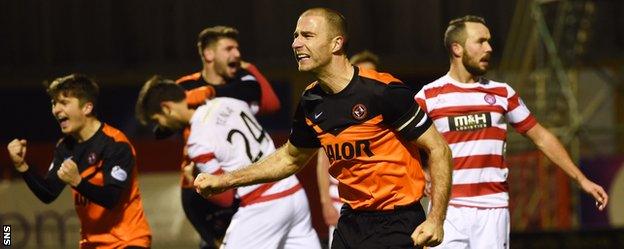 Sean Dillon celebrates scoring United's winner