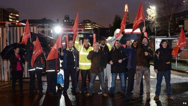 London Bus workers hold a strike outside Waterloo Bus Garage in London