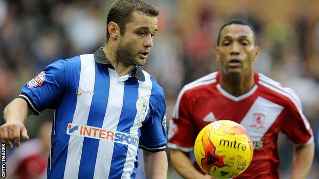 Shaun Maloney (left)