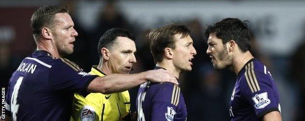 West ham team-mates James Tomkins (far right) and Mark Noble were involved in a disagreement late on