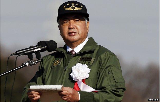 Japan's Defence Minister Gen Nakatani speaks during an annual new year military exercise by the Japanese Ground Self-Defense Force 1st Airborne Brigade at Narashino exercise field in Funabashi, east of Tokyo 11 January 2015.