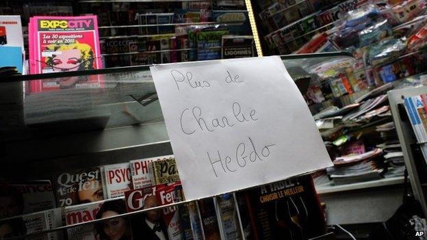 A note that reads: "No more Charlie Hebdo" is posted after all copies of the satirical newspaper were sold out at a newsstand in Paris, 14 January 2015