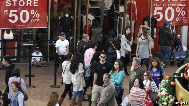 Shoppers are pictured during day after Christmas sales at Citadel Outlets in Los Angeles, California, in this file photo taken December 26, 2014.