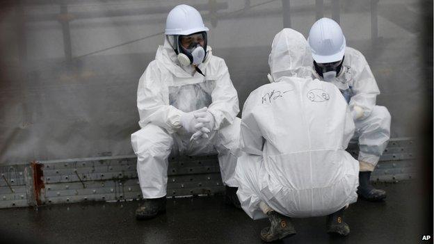 Workers at the Fukushima Daiichi nuclear power plant in November 2014