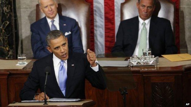 Vice President Joe Biden and House Speaker John Boehner of Ohio listens as President Barack Obama gives his State of the Union address on Capitol Hill in Washington 28 January 2014