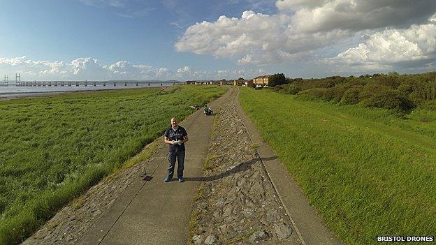 Philippe Francken takes a selfie using one of his company drones