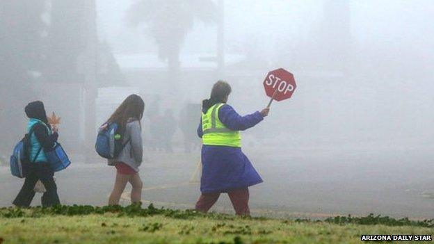 Commuters in the fog in Tucson