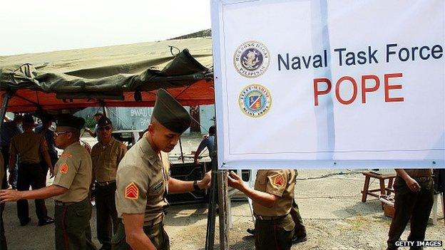 Philippine Marines gather in President Quirino Avenue ahead of the papal visit on January 15, 2015 in Manila, Philippines