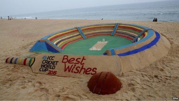 A view of the sand sculpture illustrating a cricket stadium made by Indian sand artist Sudarshan Pattnaik (unseen) prior to an event in Puri, India, 10 December 2014